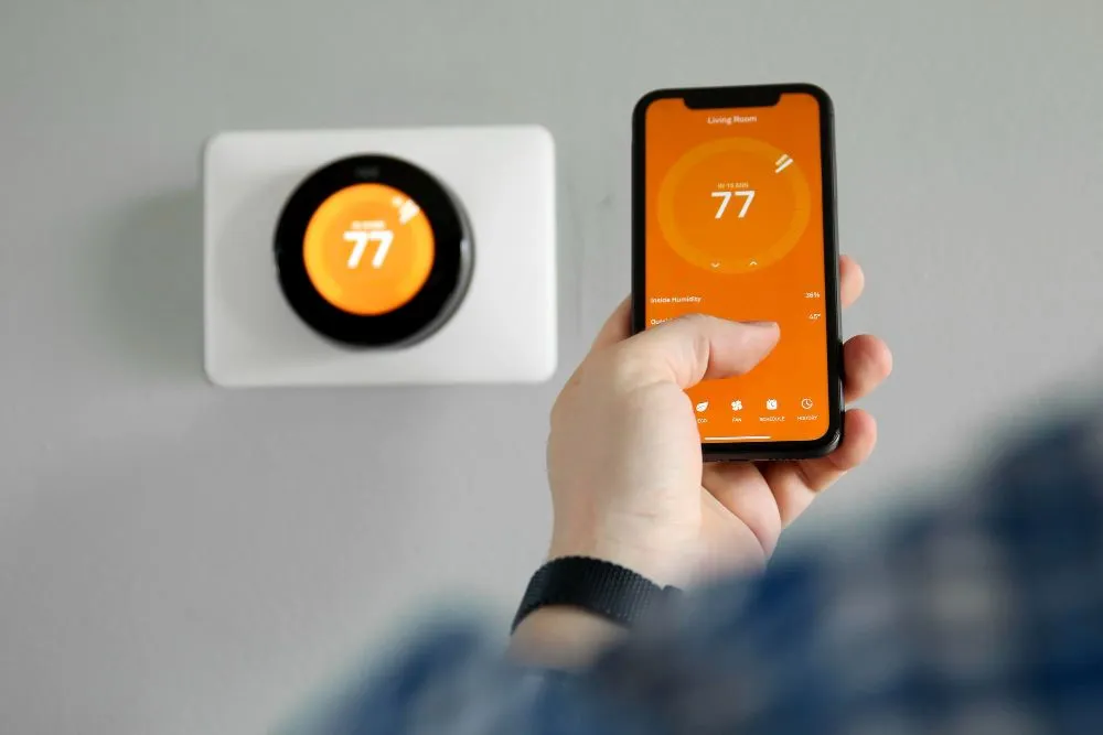 Thermostat de chauffage connecté à un téléphone